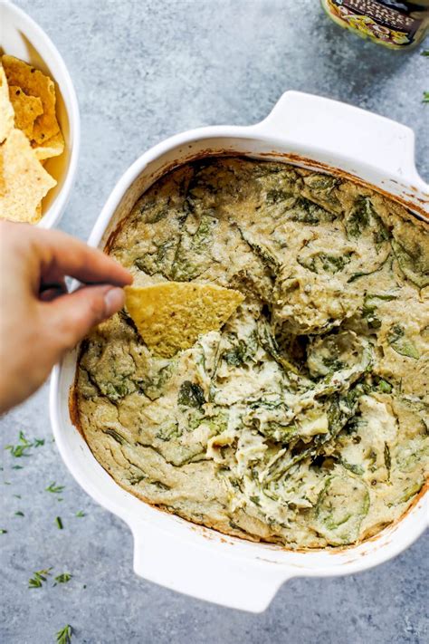 Vegan artichoke dip - Mar 22, 2023 · Add the chopped artichokes and garlic and saute for a few more minutes (Photos 2 & 3). Add the cashew cream sauce to the pan and stir it all together (Photo 4). Lastly, stir in the frozen spinach, mix it together, and let it cook until hot and bubbly. The mixture will continue to thicken as it cooks (Photos 5 & 6) . 